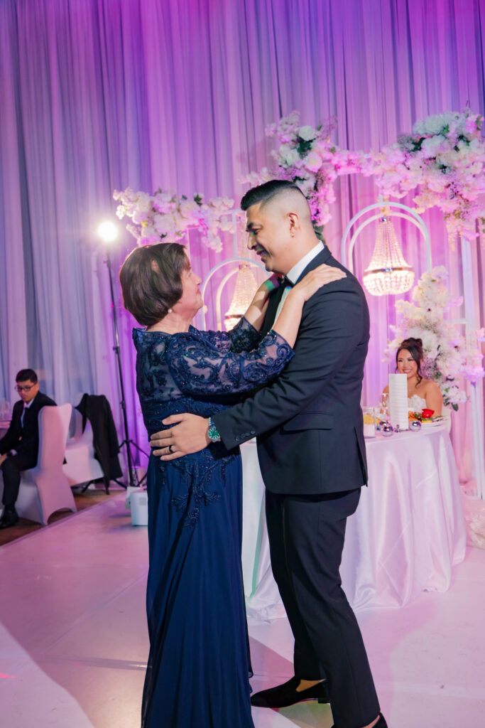 Cesar holding his mother close during their mother-son dance