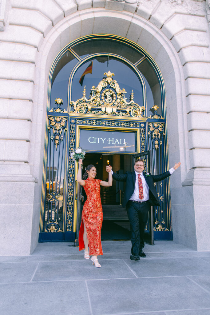 Clare and Matt celebrate outside San Francisco City Hall
