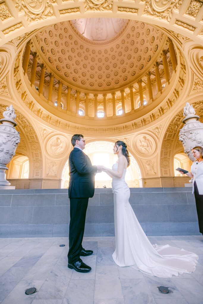 Matt and Clare exchange vows on the Fourth Floor gallery