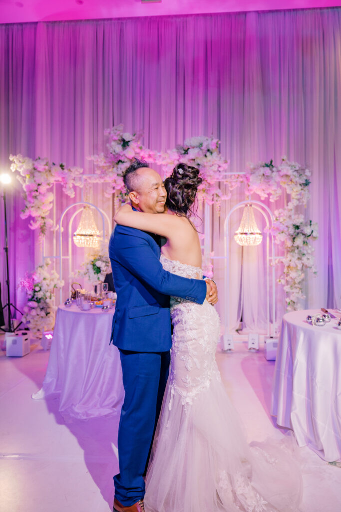 Jocelyne and her father dancing together