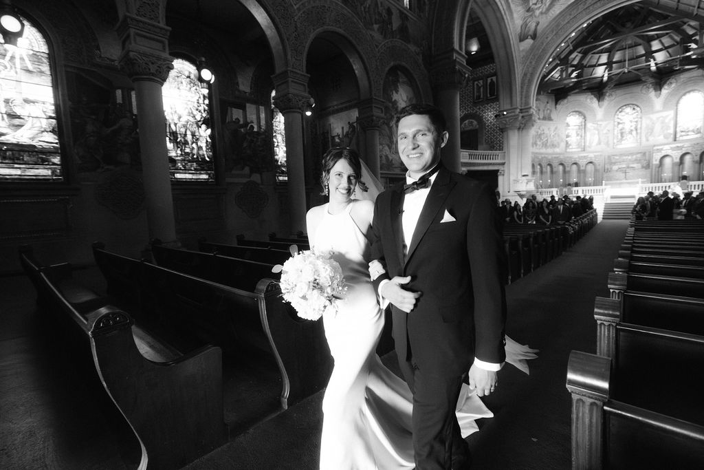 Makenna and Nicholaus walking out of Stanford Memorial Church