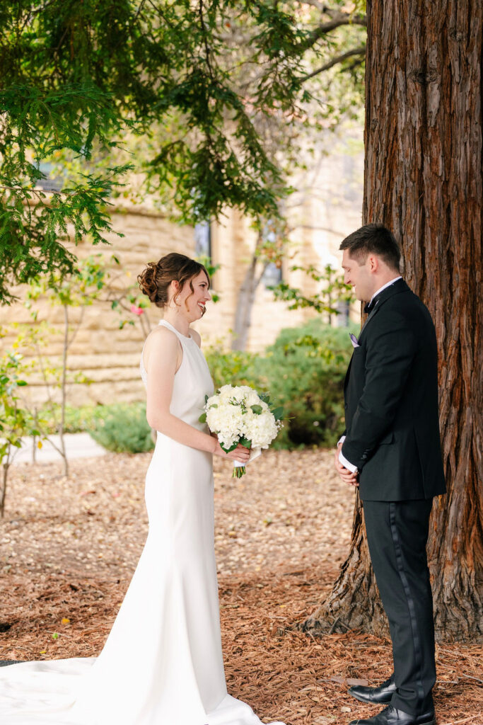Nicholaus and Mackenna’s first look outside beside a tree