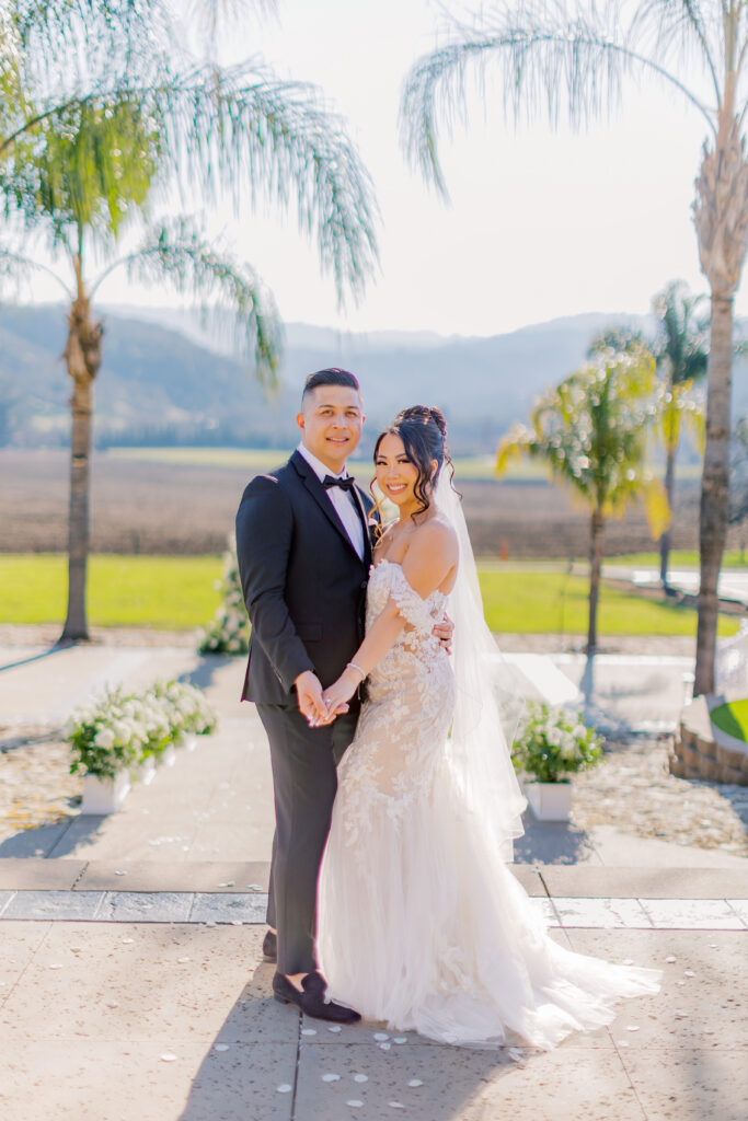 Jocelyne and Cesar pausing for a portrait in the warm afternoon light at Tuscany Escape