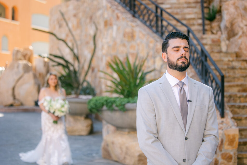 Chris waiting with eyes closed before the first look