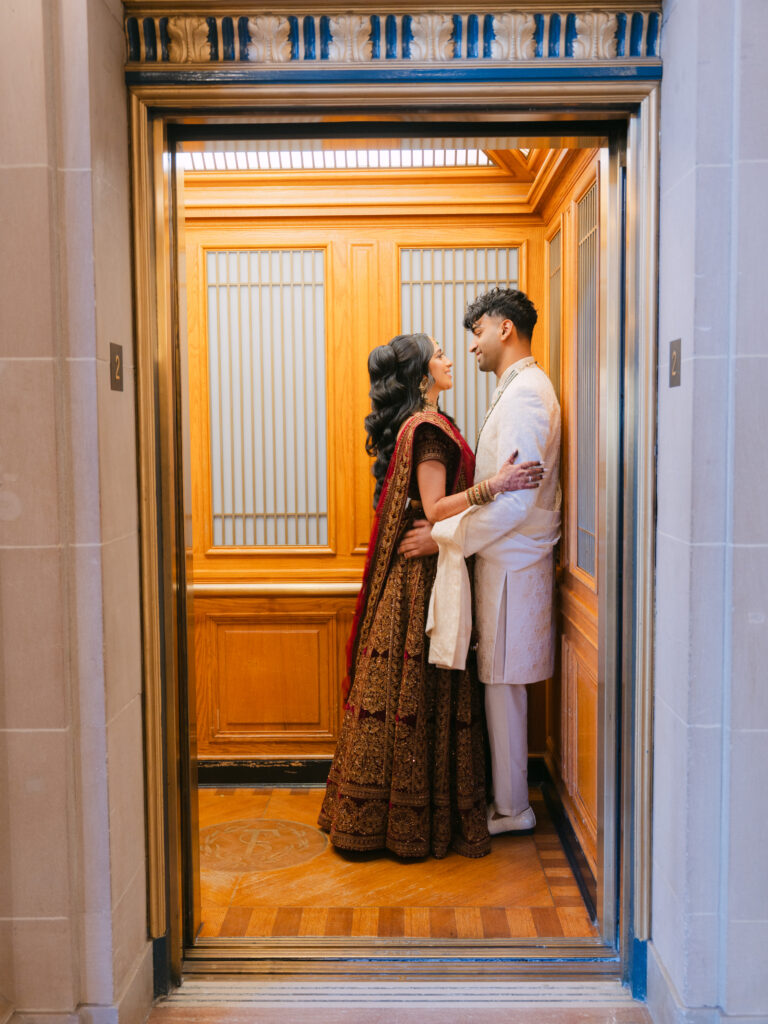 Radhika and Vyshakh share a quiet moment in an elevator
